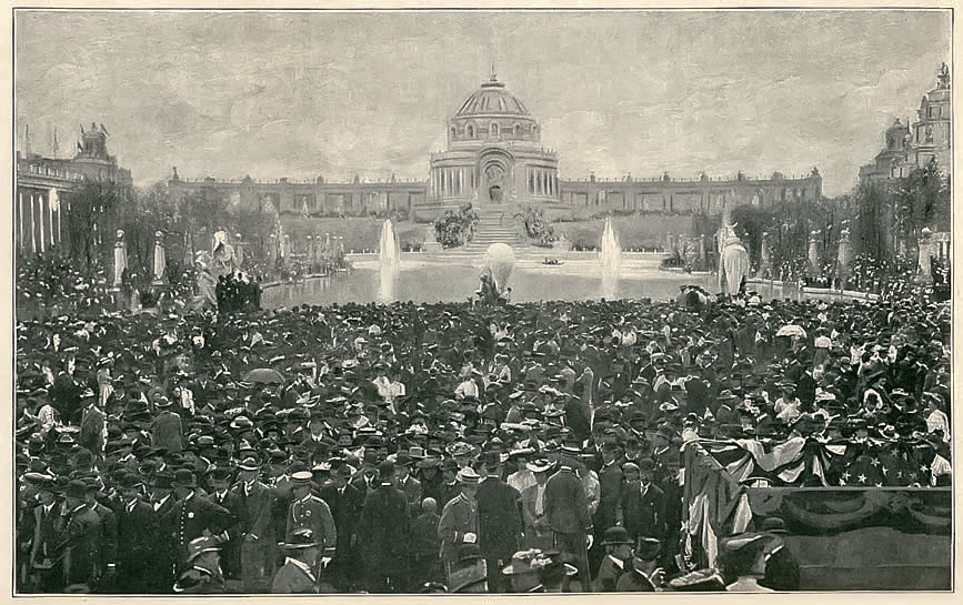 Opening-Day crowd in The Plaza of St. Louis. The Festival Hall and Terrace of States in the distance.