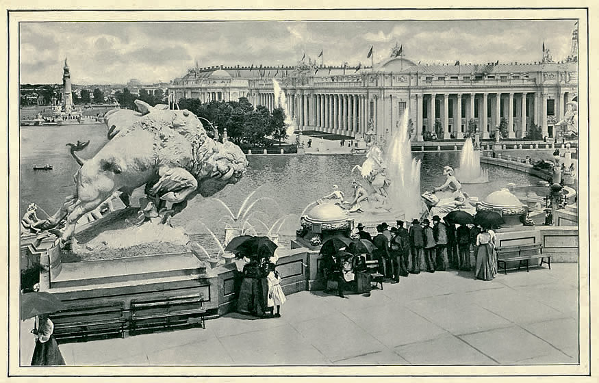 View of The Grand Basin and Louisiana Purchase Monument from the foot of The Cascades, showing The Palace of Education and Social Economy and The Palace of Manufactures.